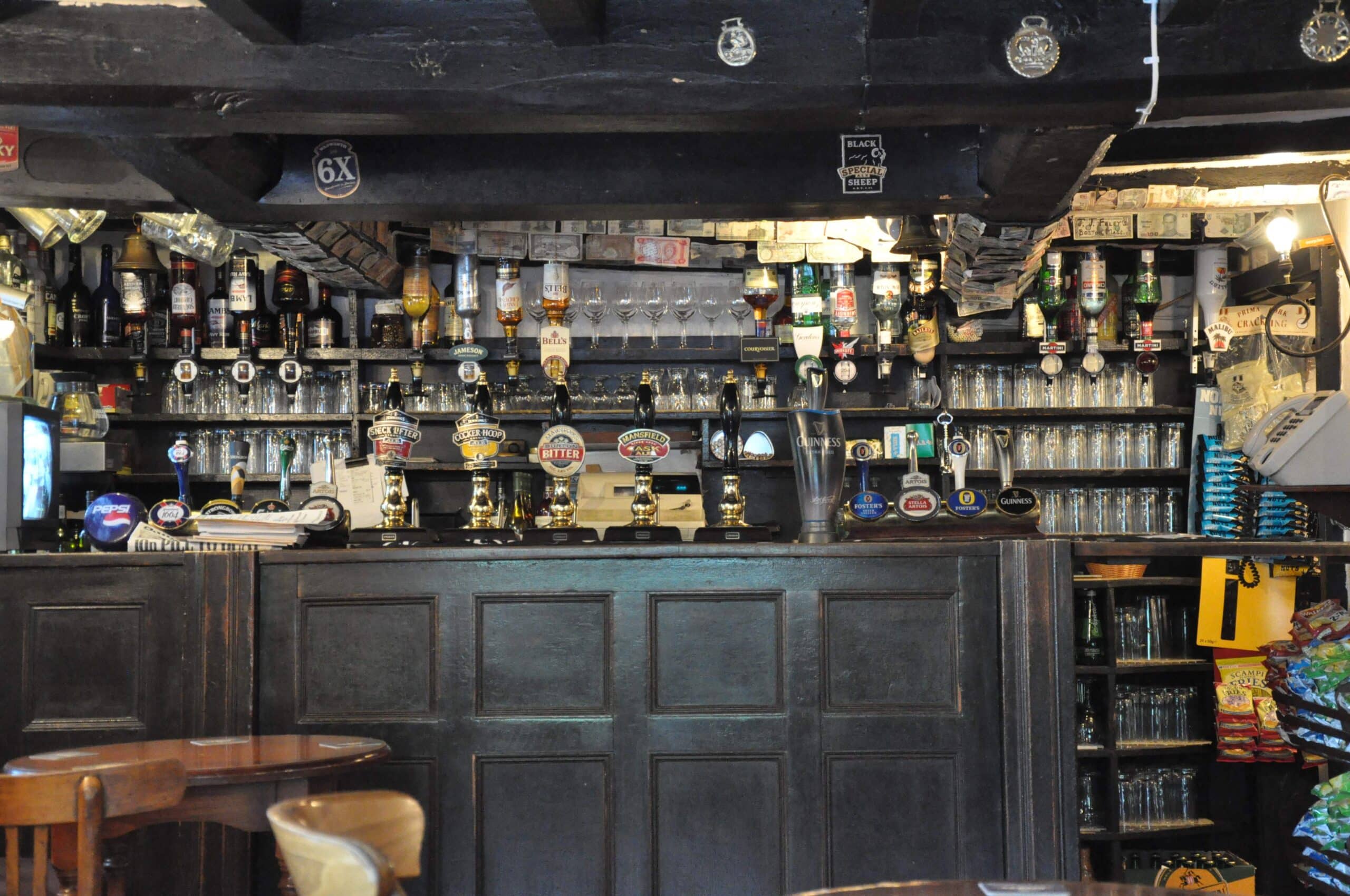 Inside the White Lion, Barthomley: the quarry-tiled bar with low beams